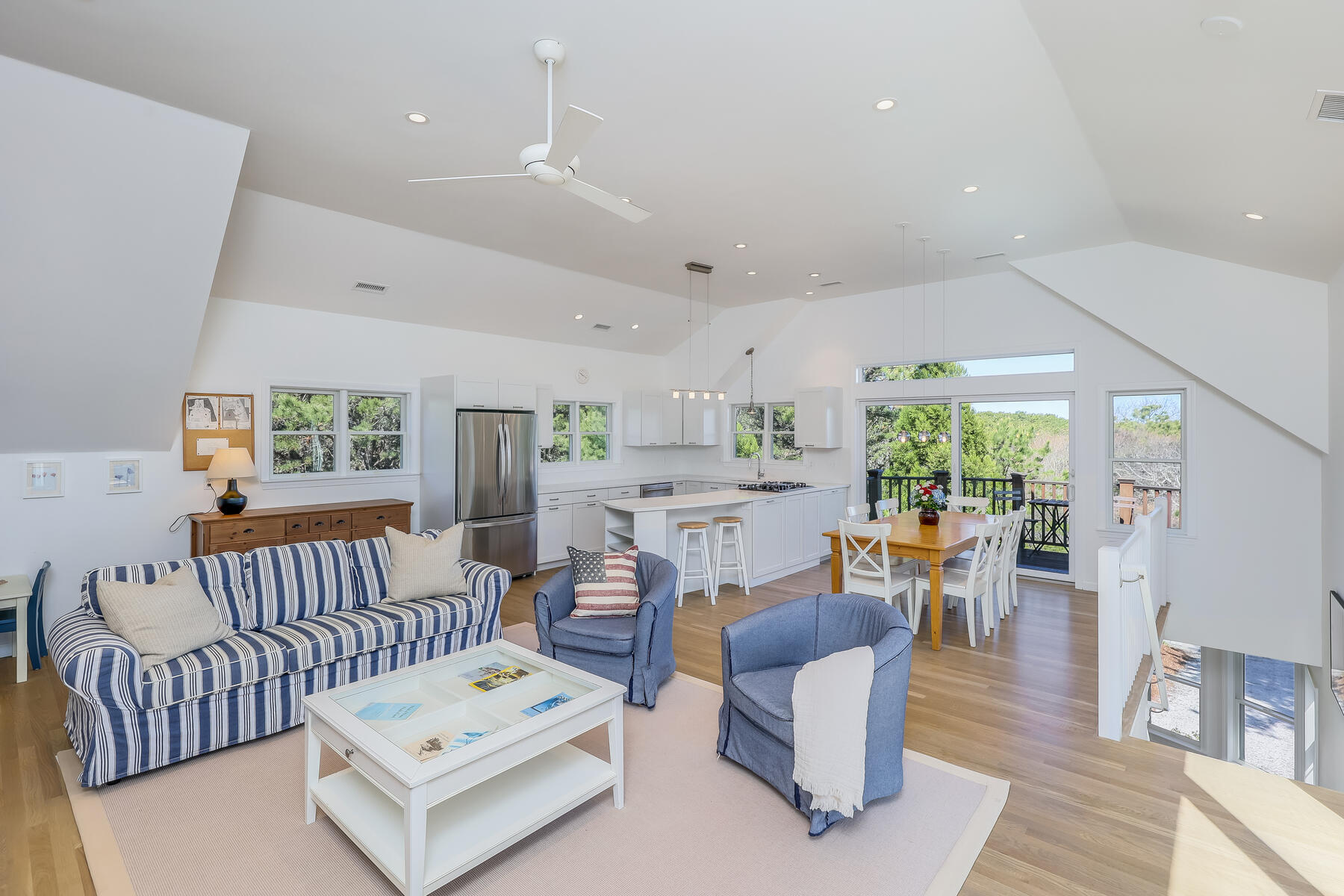 1075 3rd Avenue Wellfleet, MA 02667 - Photo 16 of 87 a living room with furniture and a large window