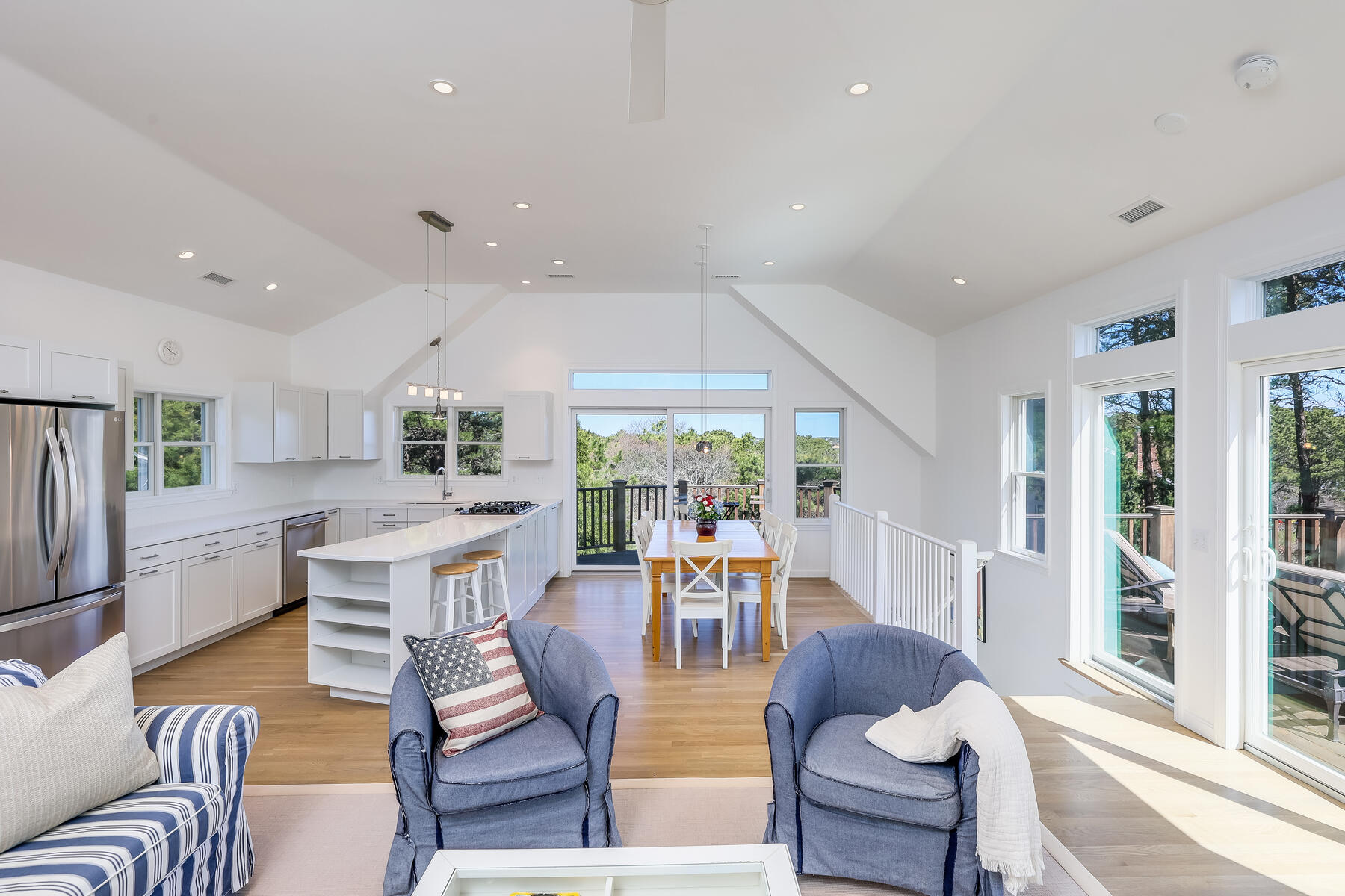 1075 3rd Avenue Wellfleet, MA 02667 - Photo 17 of 87 a living room with fireplace furniture and a large window