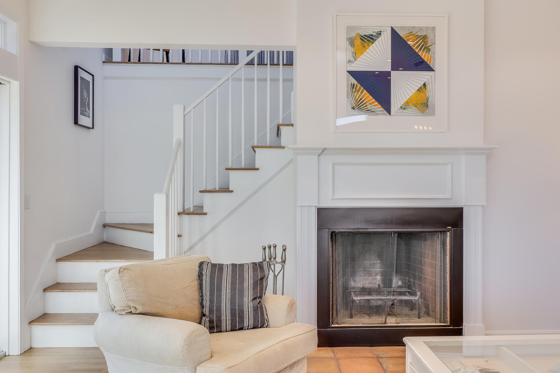 1075 3rd Avenue Wellfleet, MA 02667 - Photo 35 of 87 a living room with furniture and a fireplace
