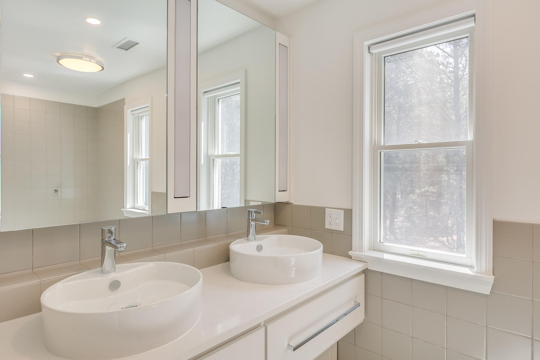 1075 3rd Avenue Wellfleet, MA 02667 - Photo 49 of 87 a bathroom with a sink and a window