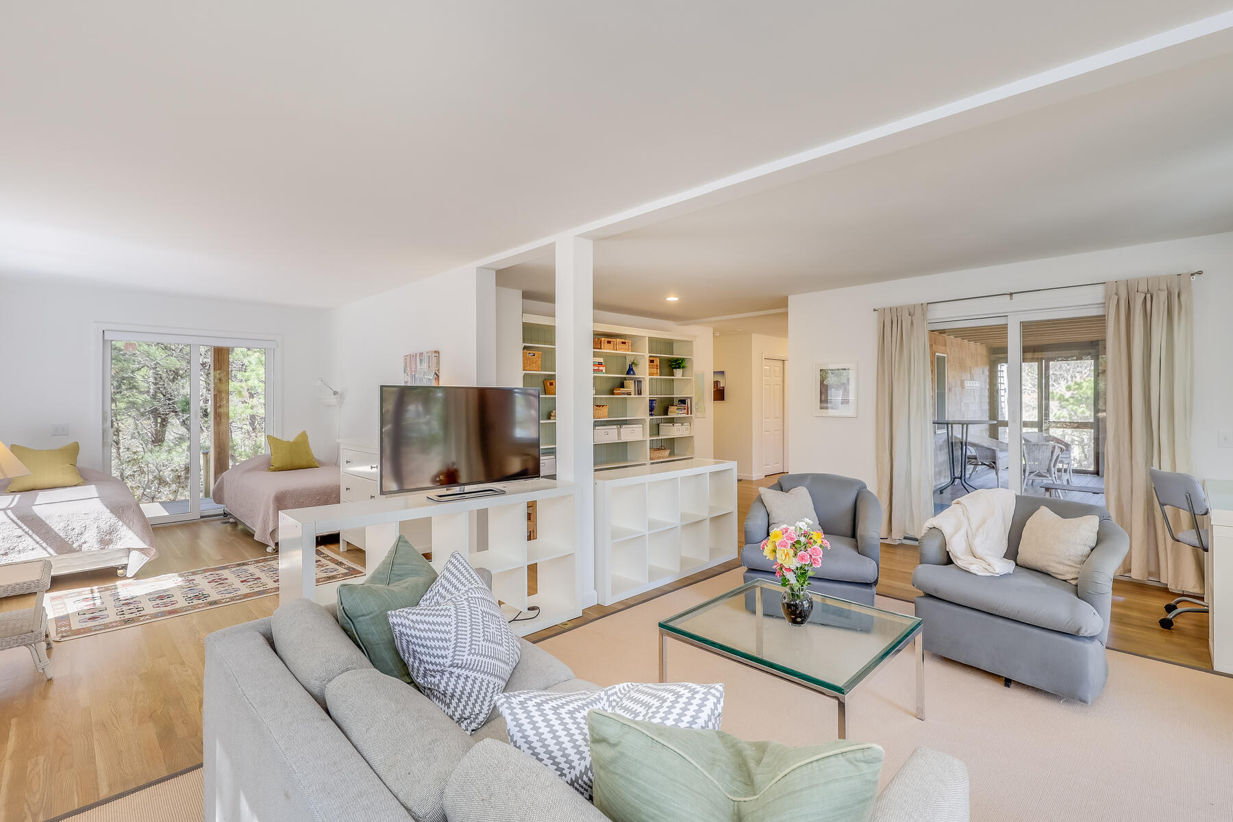 1075 3rd Avenue Wellfleet, MA 02667 - Photo 54 of 87 a living room with furniture and a flat screen tv