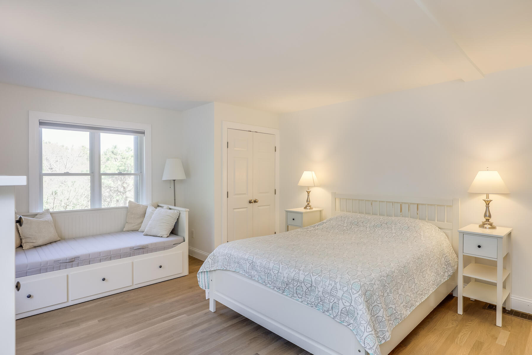 1075 3rd Avenue Wellfleet, MA 02667 - Photo 63 of 87 a bedroom with a bed and a couch