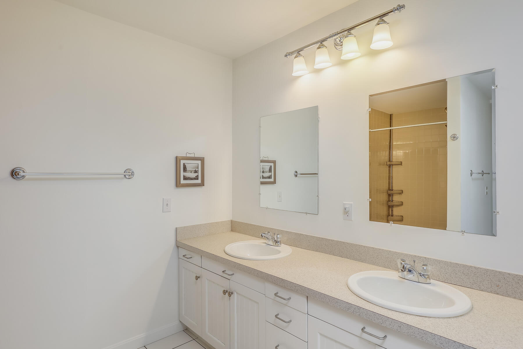 1075 3rd Avenue Wellfleet, MA 02667 - Photo 65 of 87 a bathroom with a granite countertop sink a mirror and a shower
