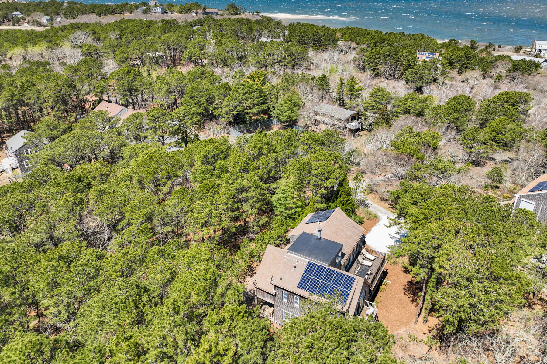 1075 3rd Avenue Wellfleet, MA 02667 - Photo 10 of 87 an aerial view of residential house with outdoor space and trees all around