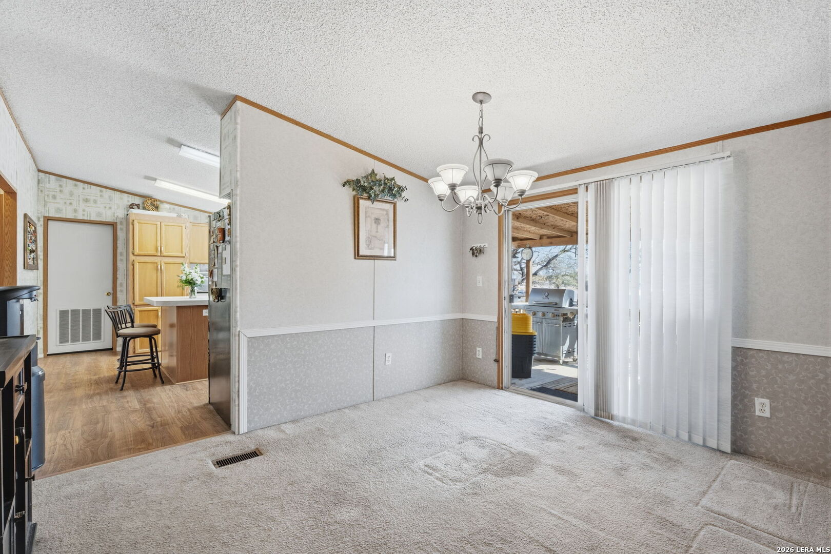 708 Mesquite Street Jourdanton, TX 78026 - Photo 14 of 49 a view of livingroom with dining area