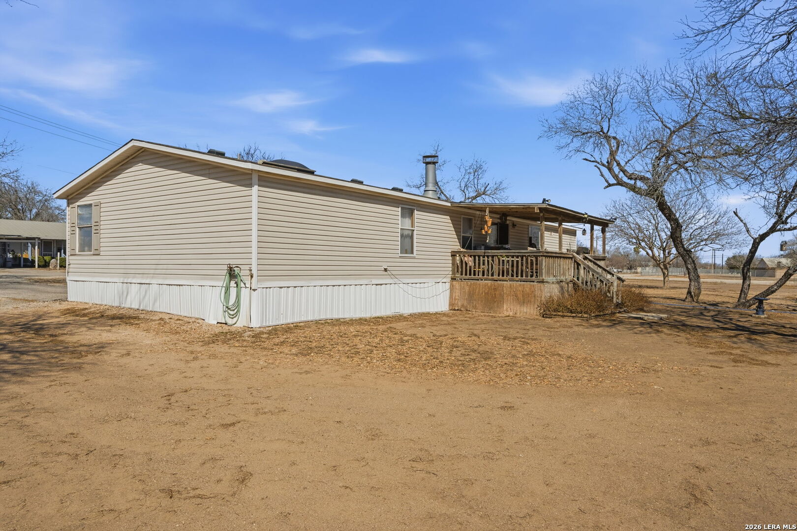 708 Mesquite Street Jourdanton, TX 78026 - Photo 18 of 49 a view of a house with a snow