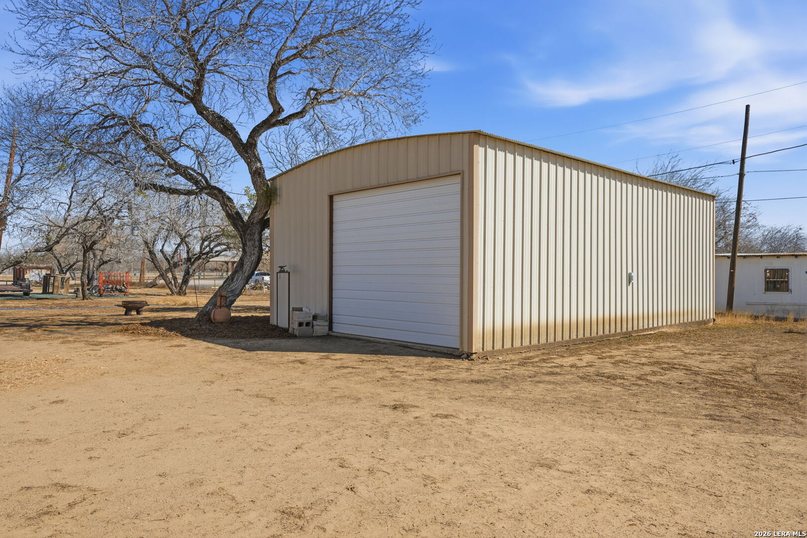 708 Mesquite Street Jourdanton, TX 78026 - Photo 19 of 49 a view of a garage