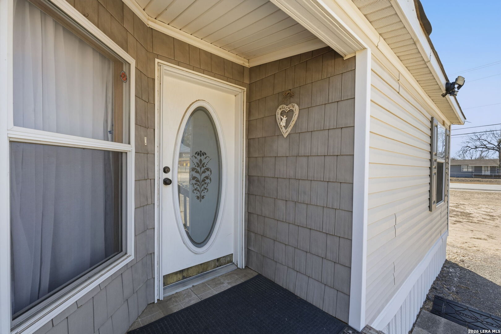 708 Mesquite Street Jourdanton, TX 78026 - Photo 4 of 49 a view of a livingroom with washer and dryer