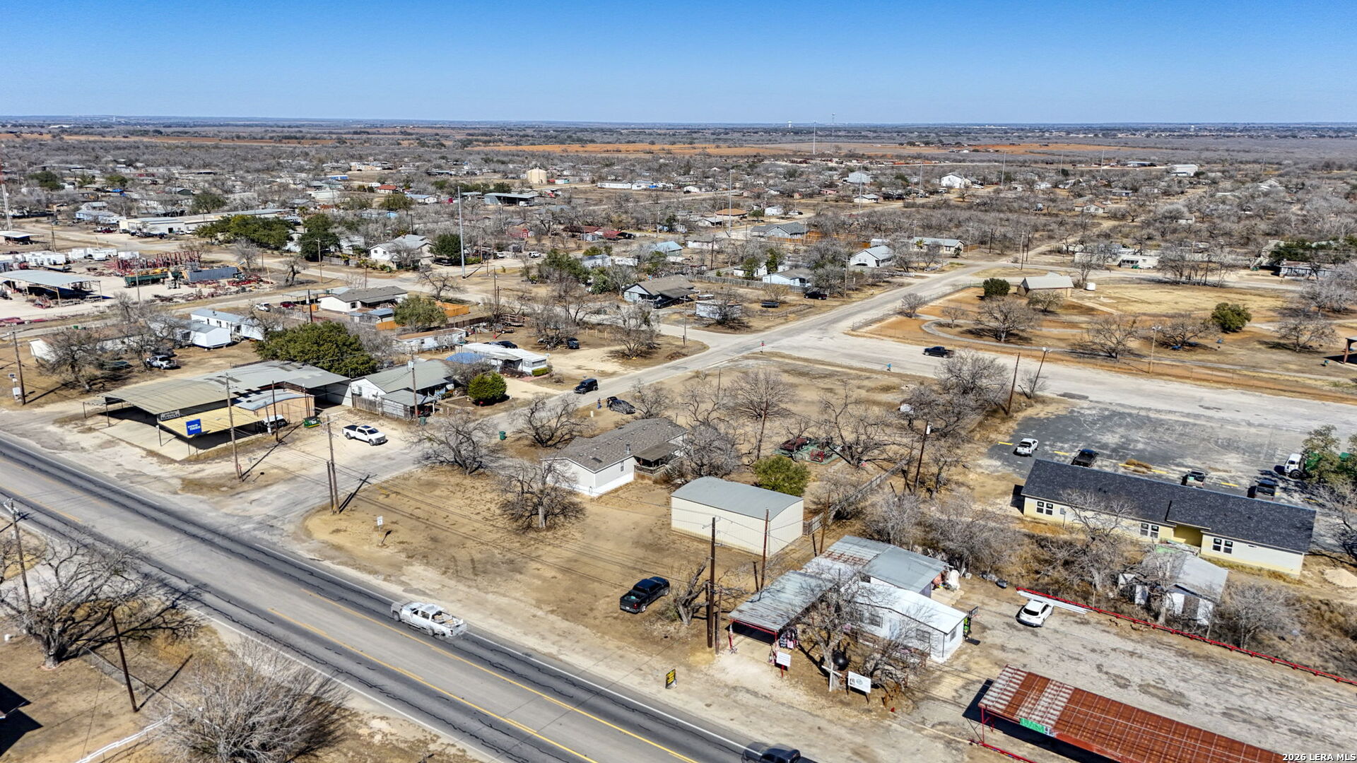 708 Mesquite Street Jourdanton, TX 78026 - Photo 42 of 49 an aerial view of multiple house