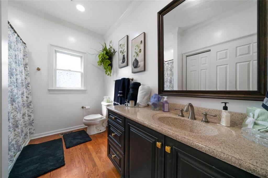 111 Warwick Way Rome, GA 30161 - Photo 22 of 46 a bathroom with a granite countertop sink mirror and toilet