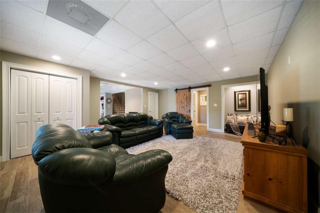 111 Warwick Way Rome, GA 30161 - Photo 31 of 46 a living room with furniture and wooden floor