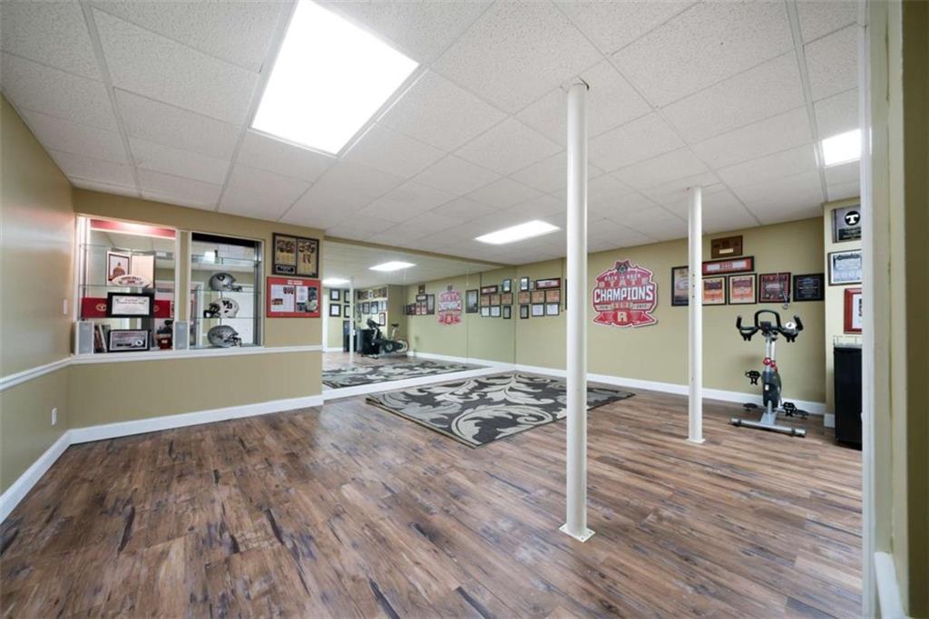 111 Warwick Way Rome, GA 30161 - Photo 34 of 46 a view of a livingroom with wooden floor and window