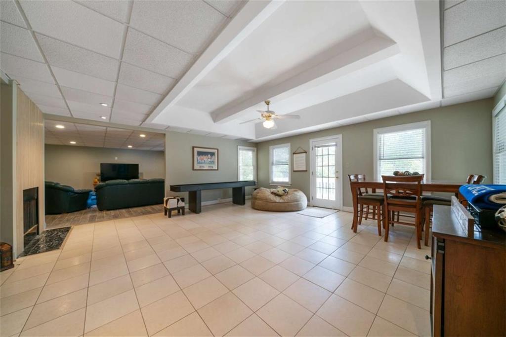 111 Warwick Way Rome, GA 30161 - Photo 36 of 46 a large room with furniture a table and chairs