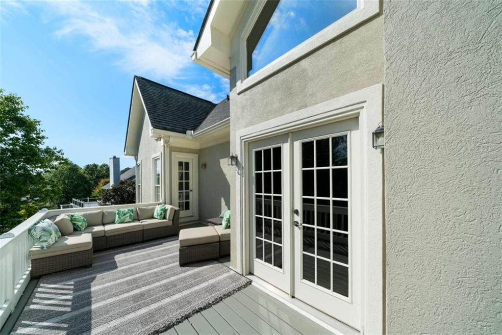111 Warwick Way Rome, GA 30161 - Photo 39 of 46 a view of a balcony with two couches and a potted plant with sky view