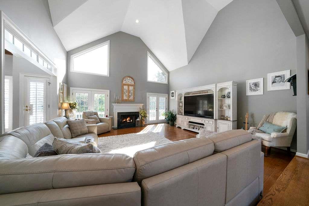 111 Warwick Way Rome, GA 30161 - Photo 7 of 46 a living room with furniture a fireplace and a flat screen tv