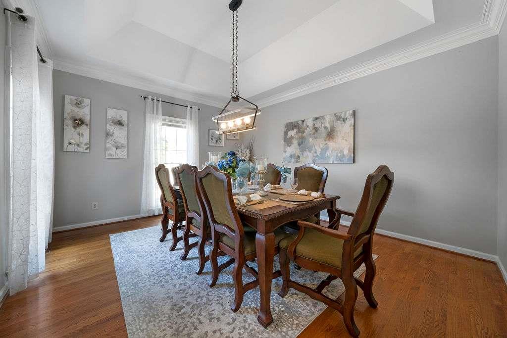 111 Warwick Way Rome, GA 30161 - Photo 8 of 46 a view of a dining room with furniture window and wooden floor