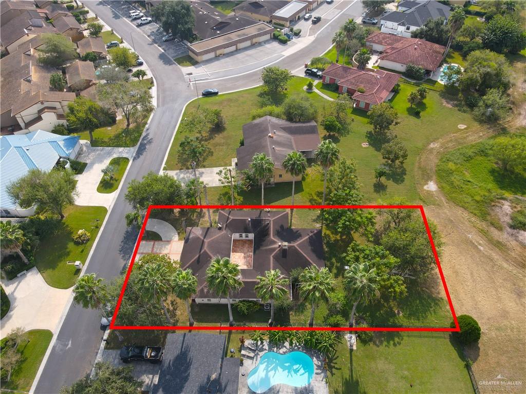 314 Santa Ana Avenue Rancho Viejo, TX 78575 - Photo 26 of 30 an aerial view of house with swimming pool