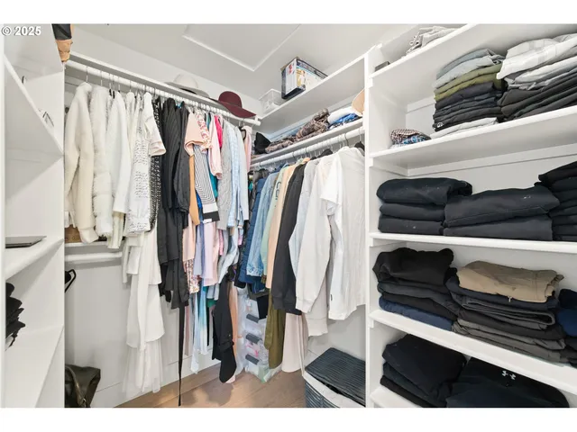 a bathroom with a double vanity sink mirror and toilet
