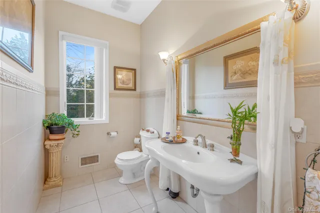 a bathroom with a bathtub and a sink