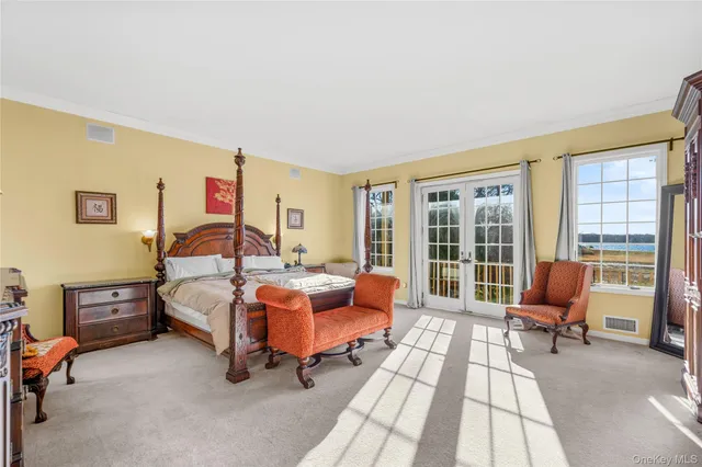 a livingroom with furniture and a flat screen tv