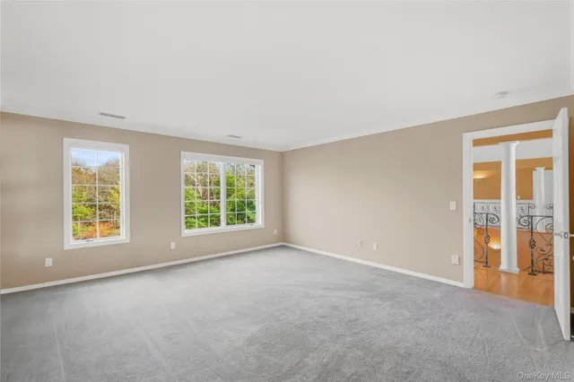 a bathroom with a tub a toilet and a shower
