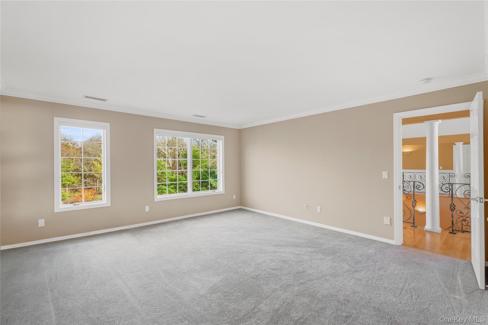 28 Old Neck Road South Center Moriches, NY 11934 - Photo 19 of 43 an empty room with windows