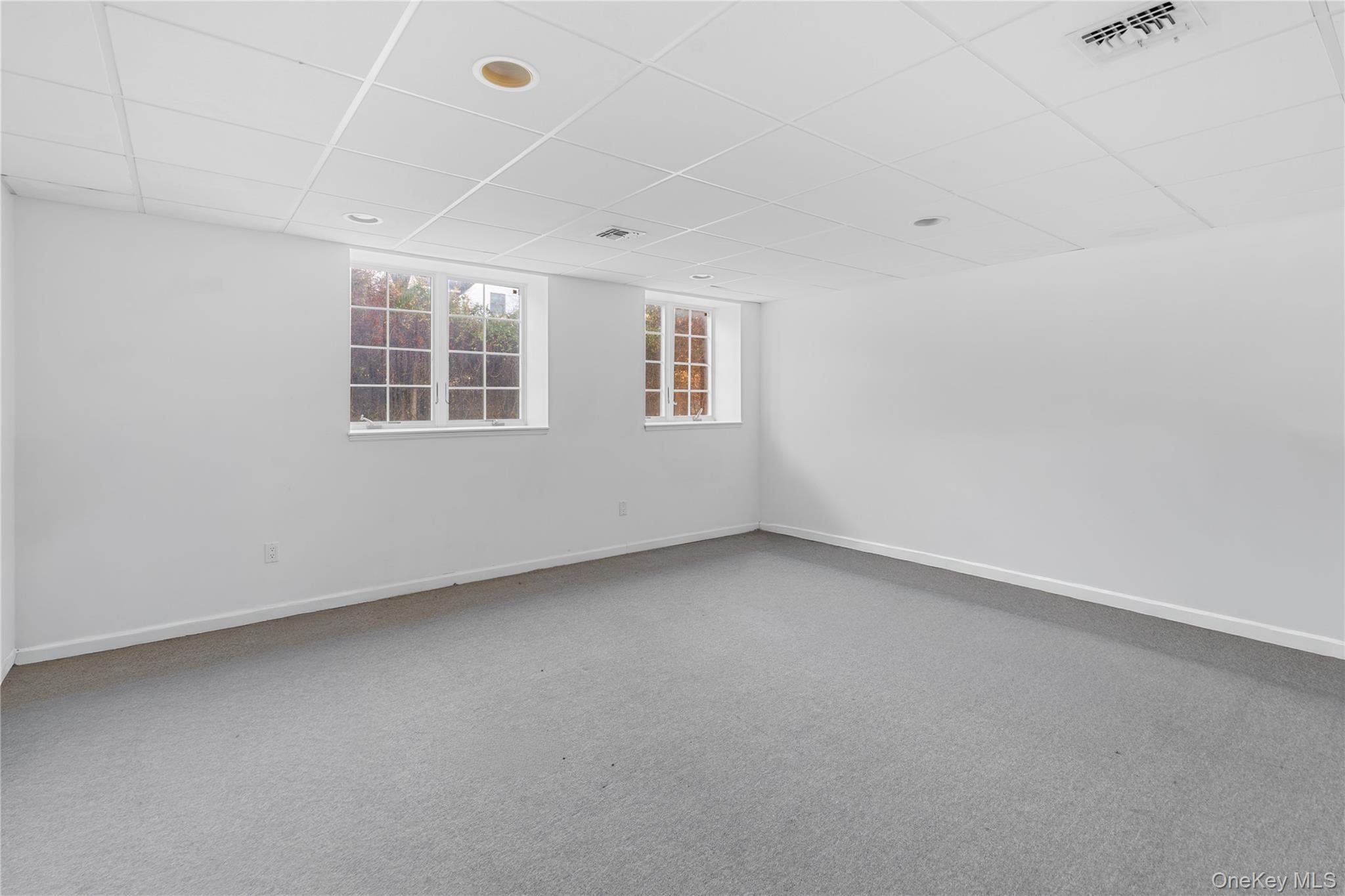 28 Old Neck Road South Center Moriches, NY 11934 - Photo 24 of 43 an empty room with windows