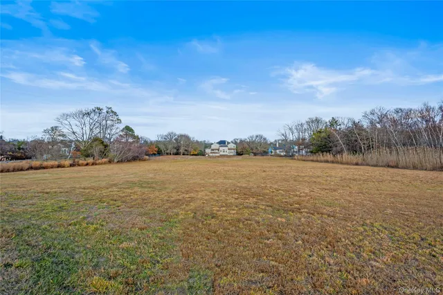 a view of houses with swimming pool