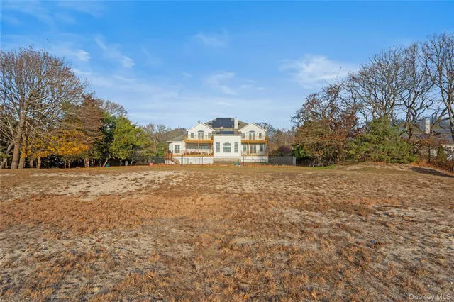 an aerial view of residential building with ocean view