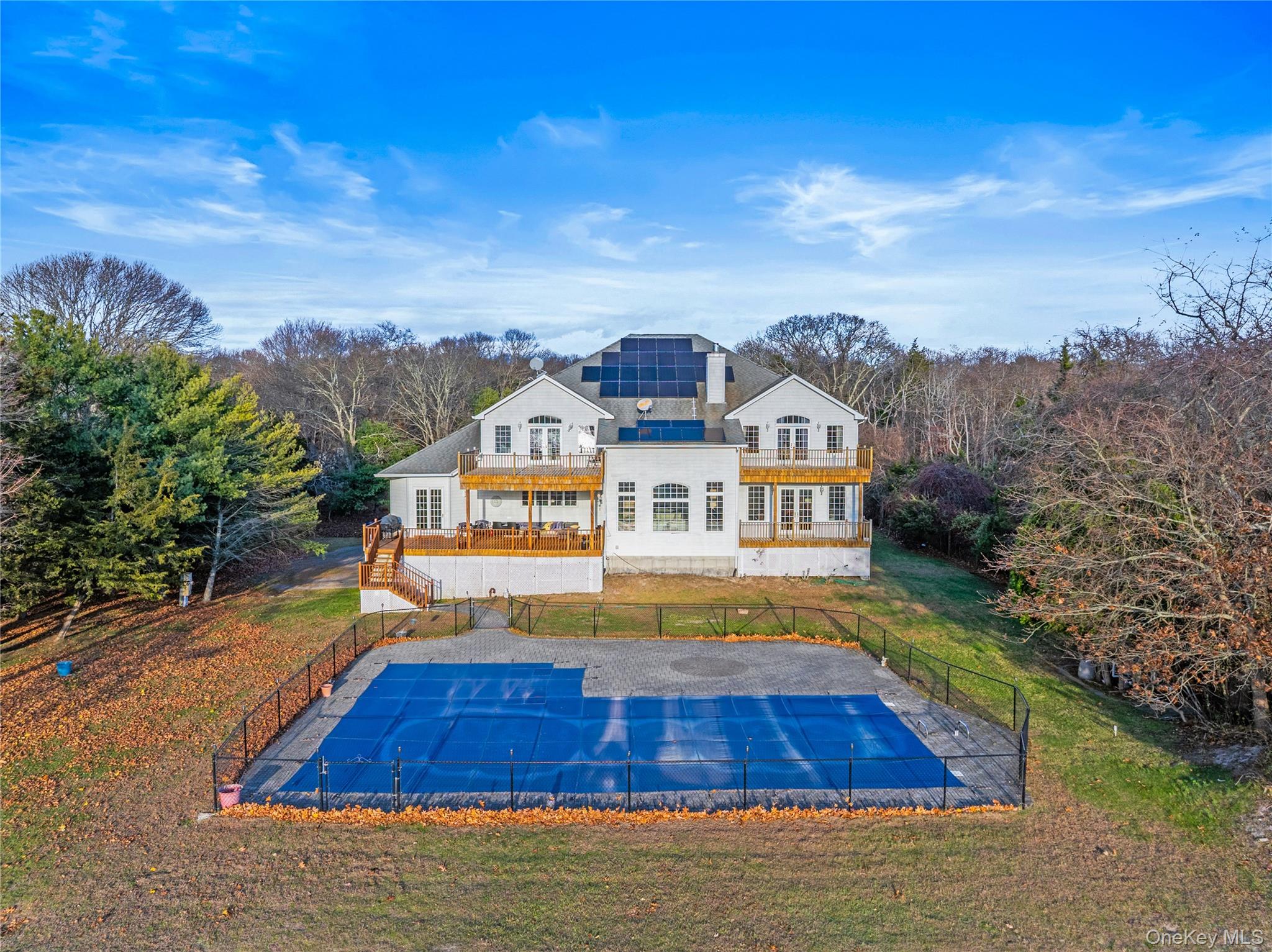 28 Old Neck Road South Center Moriches, NY 11934 - Photo 41 of 43 a view of houses with swimming pool