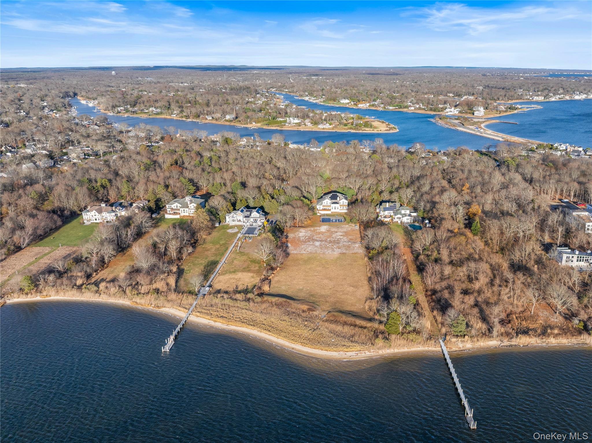 28 Old Neck Road South Center Moriches, NY 11934 - Photo 42 of 43 an aerial view of residential building with ocean view