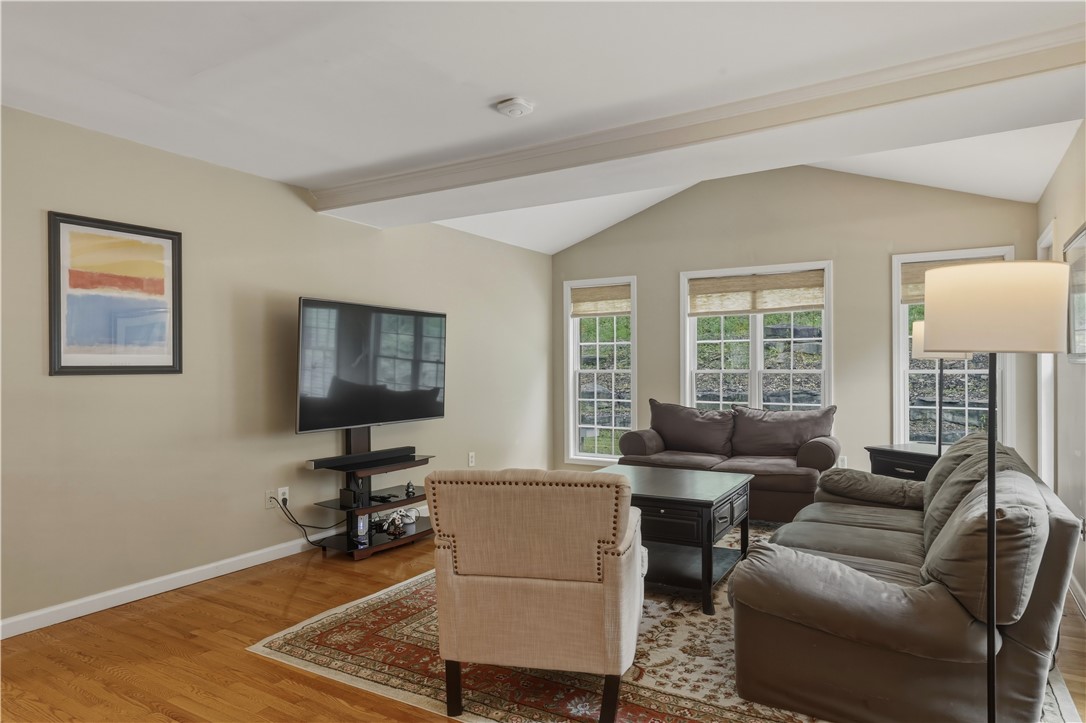 3200 Goff Road Corning, NY 14830 - Photo 8 of 50 Family Room with a raised ceiling and hardwood flo