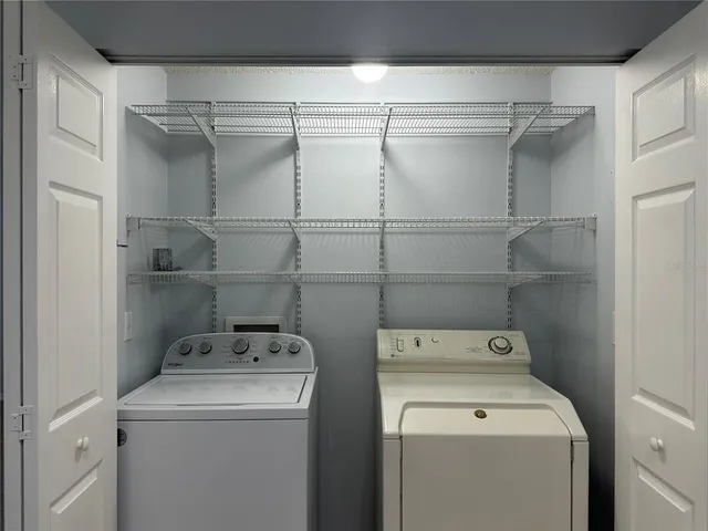 a bathroom with a toilet and a tub