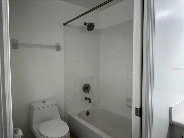 a view of a room that has a window in it