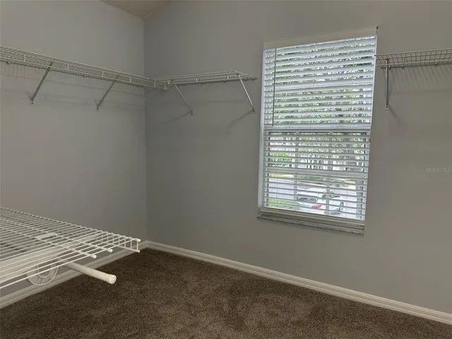 a view of a room with racks on the wall