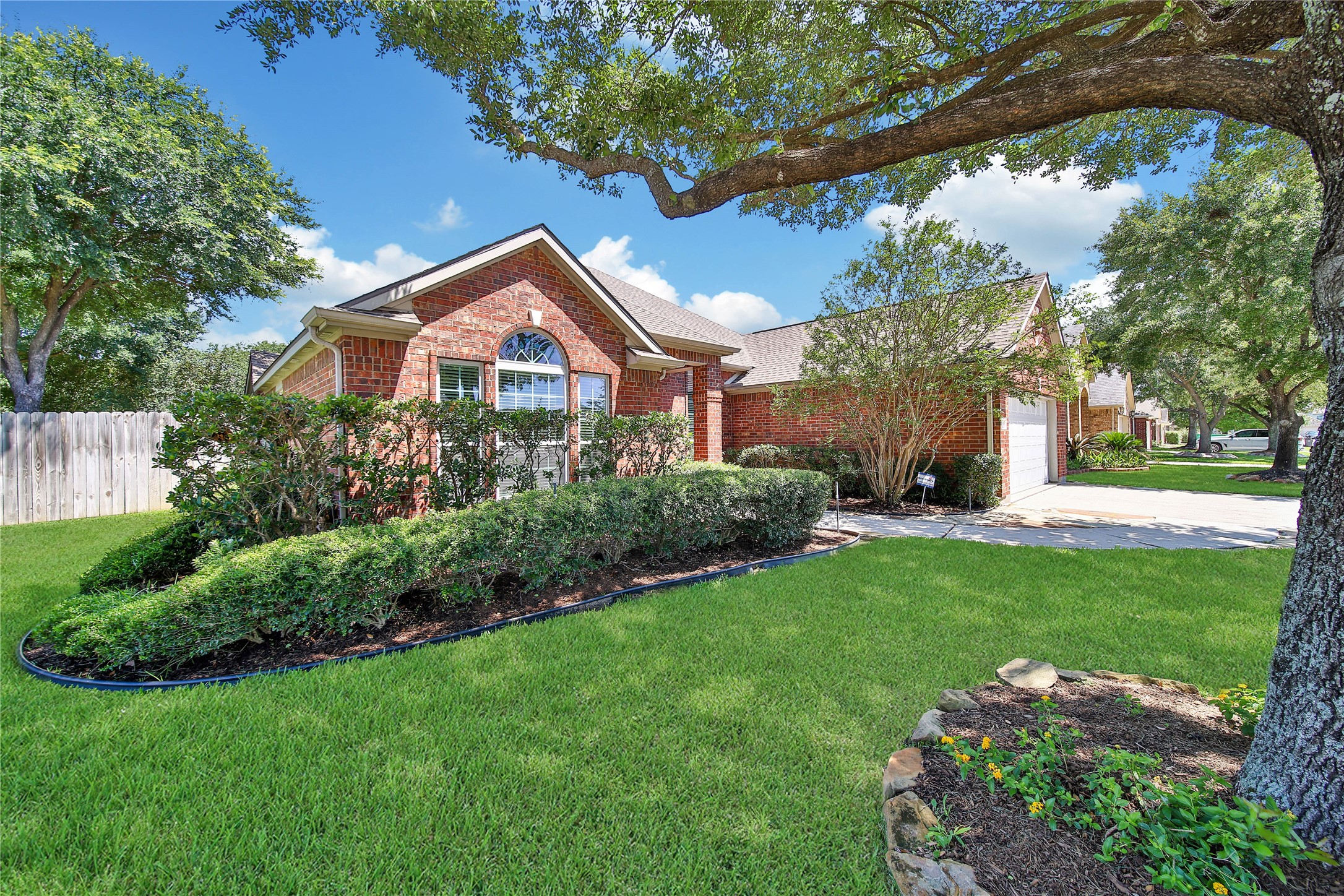 21338 Timber Pines Drive Spring, TX 77388 - Photo 3 of 29 a front view of a house with a yard