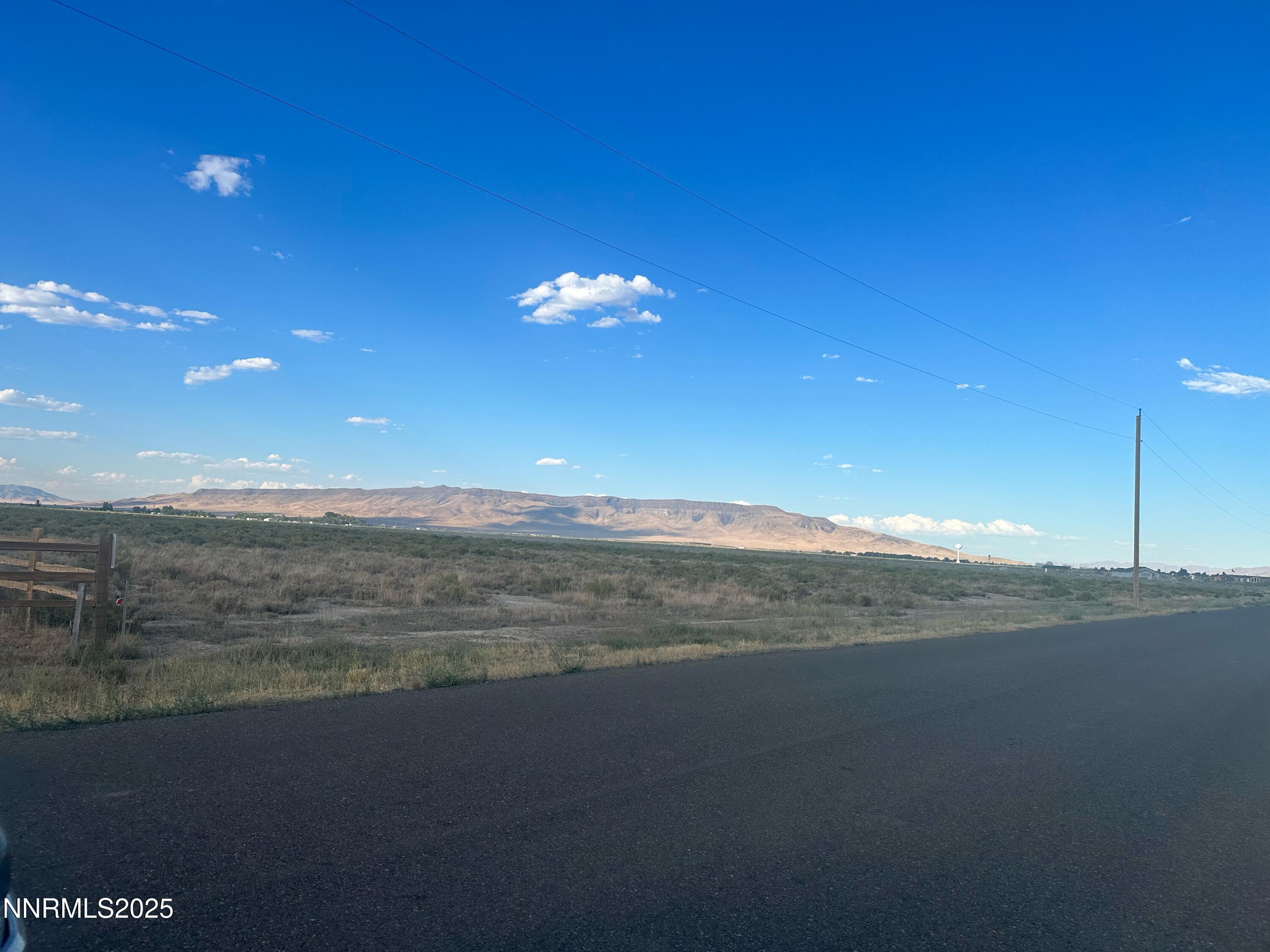 a view of an ocean and a building