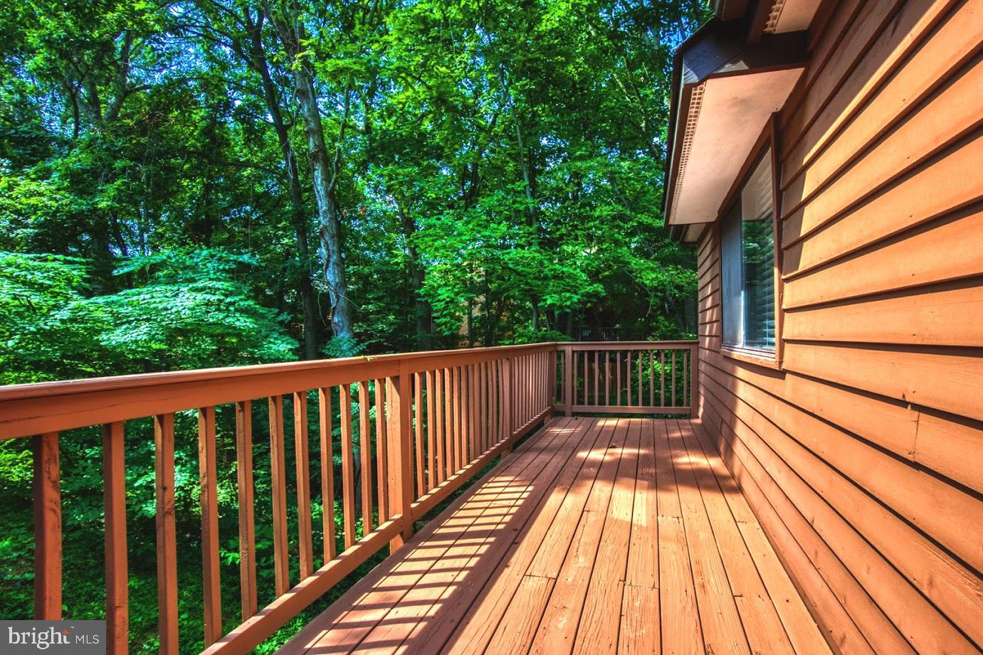 2122 South Bay Lane Reston, VA 20191 - Photo 33 of 41 The deck runs the full length of the house