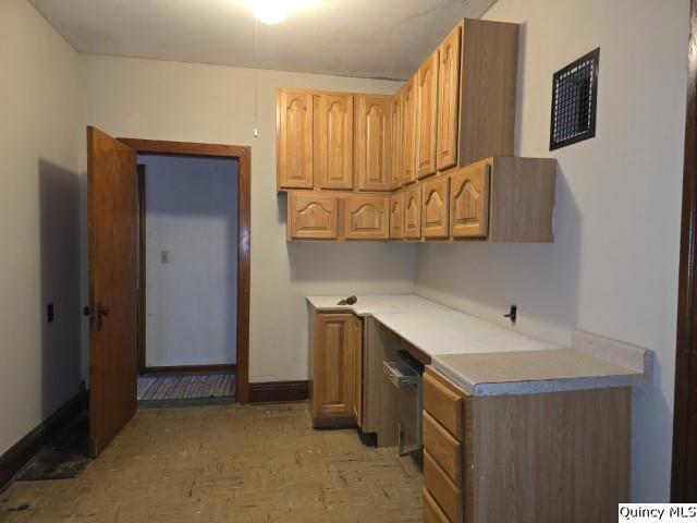 102 Center Street Augusta, IL 62311 - Photo 16 of 31 a utility room with a sink a washer and dryer
