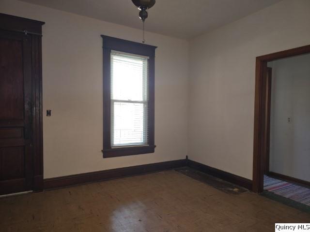 102 Center Street Augusta, IL 62311 - Photo 17 of 31 an empty room with a window
