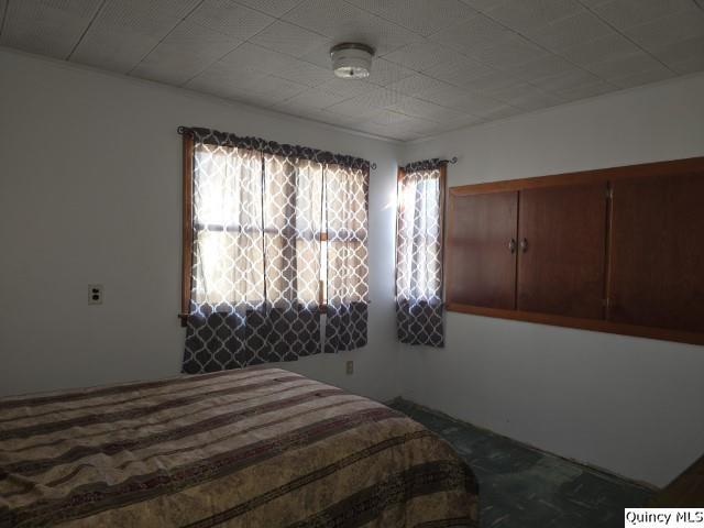 102 Center Street Augusta, IL 62311 - Photo 19 of 31 a bedroom with a bed and a window