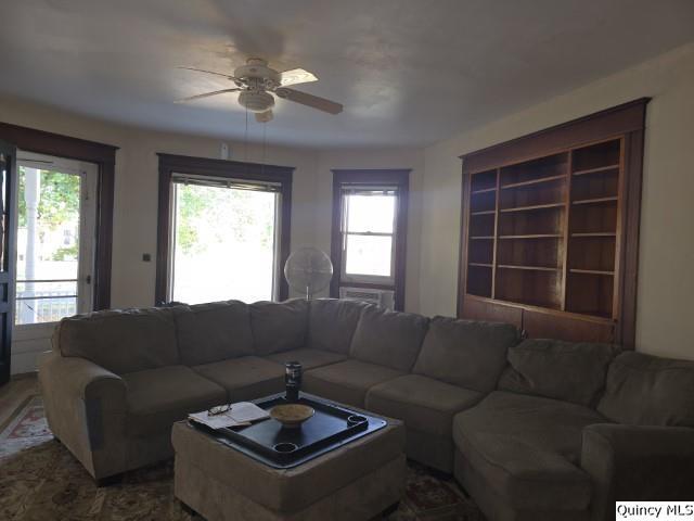 102 Center Street Augusta, IL 62311 - Photo 23 of 31 a living room with furniture and a large window