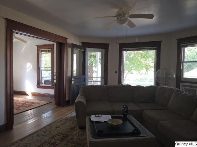 102 Center Street Augusta, IL 62311 - Photo 24 of 31 a living room with furniture and a large window