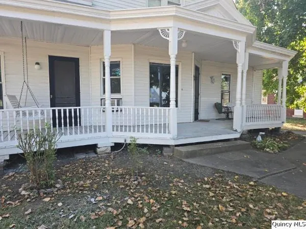 a house view with a outdoor space