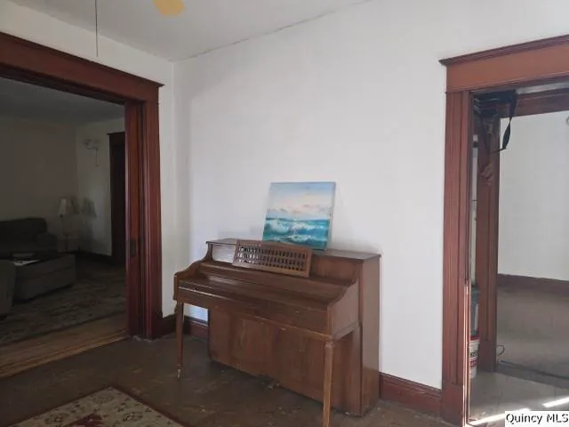 a room that has a bed and a mirror