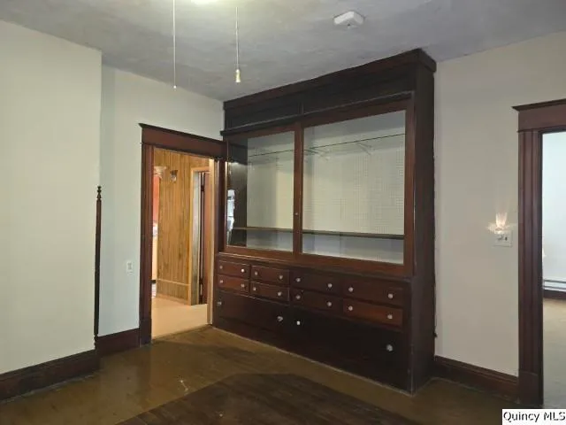 a bathroom with a sink a mirror and a shower