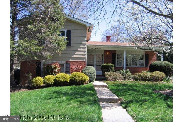 4600 Hawksbury Road Pikesville, MD 21208 - Photo 1 of 17 front view of a house with a yard