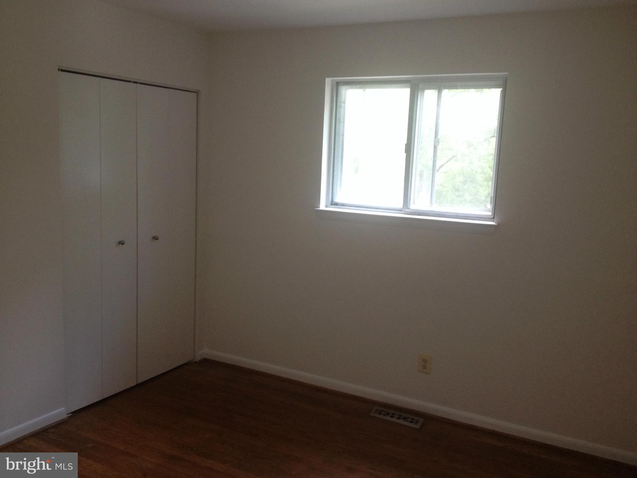 4600 Hawksbury Road Pikesville, MD 21208 - Photo 15 of 17 an empty room with a window