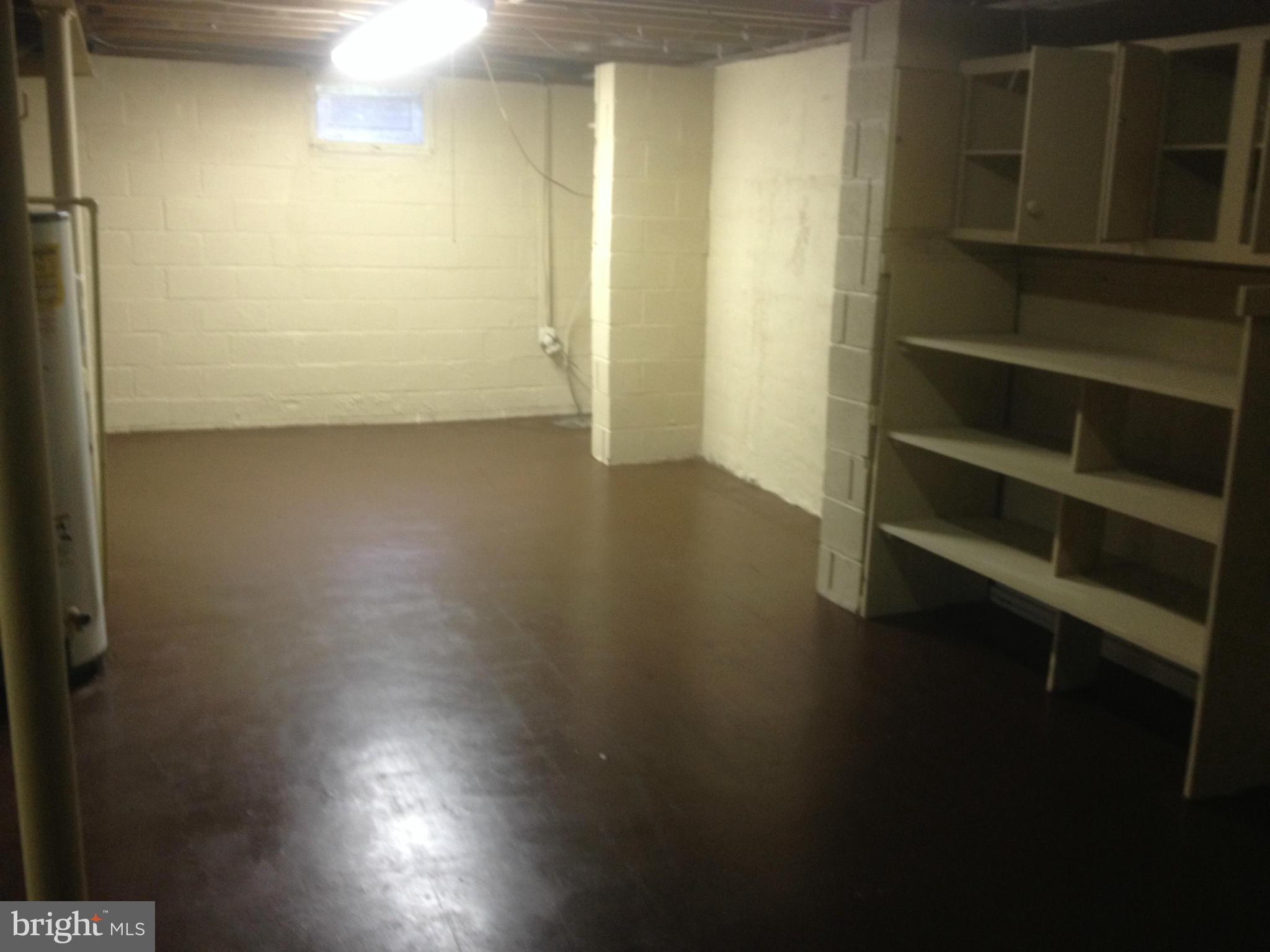 4600 Hawksbury Road Pikesville, MD 21208 - Photo 9 of 17 a view of room with wooden floor