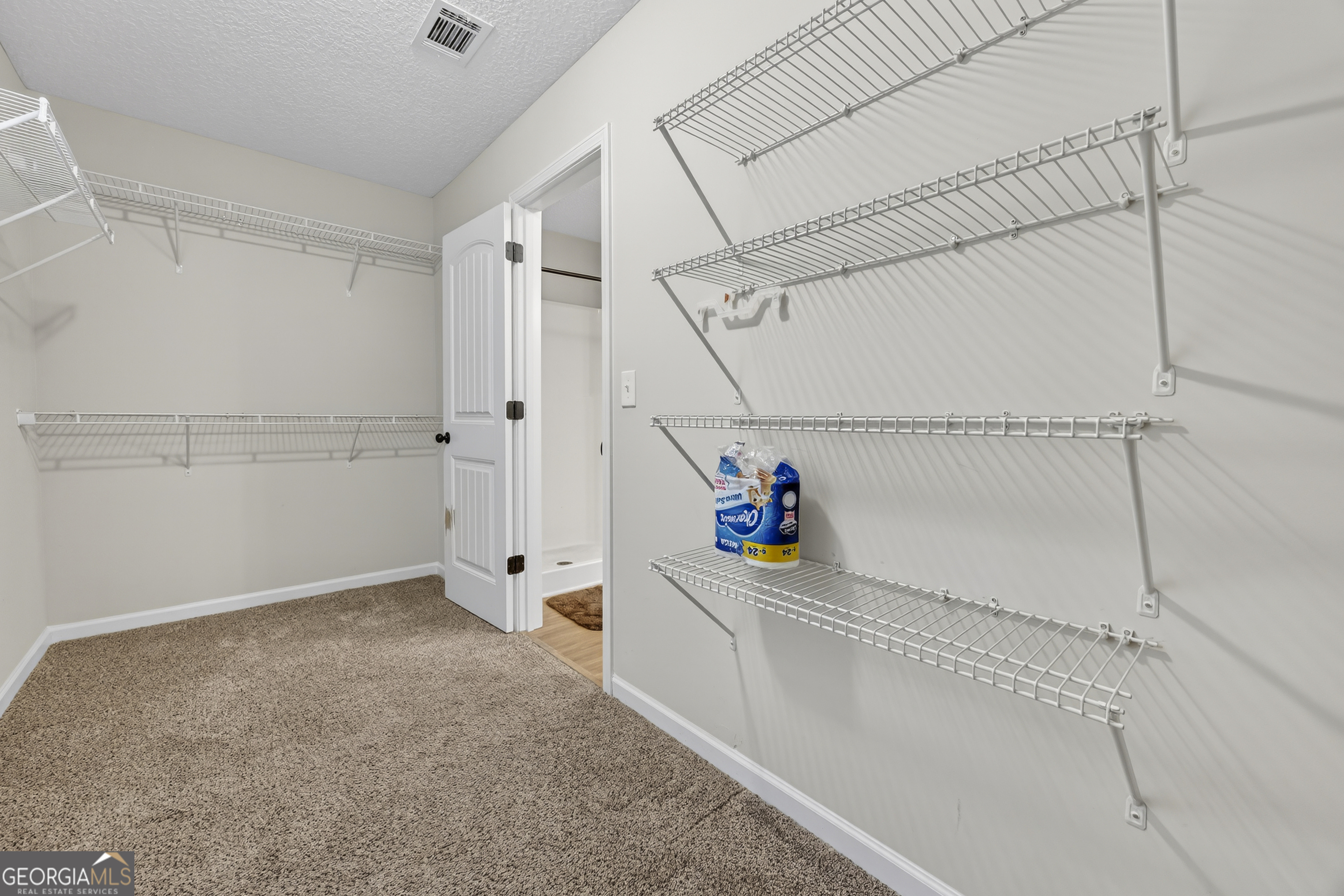 717 Oconee Lane Commerce, GA 30529 - Photo 24 of 57 a bathroom with a bathtub and shower
